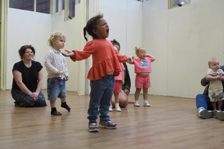 Children singing in a supervised group